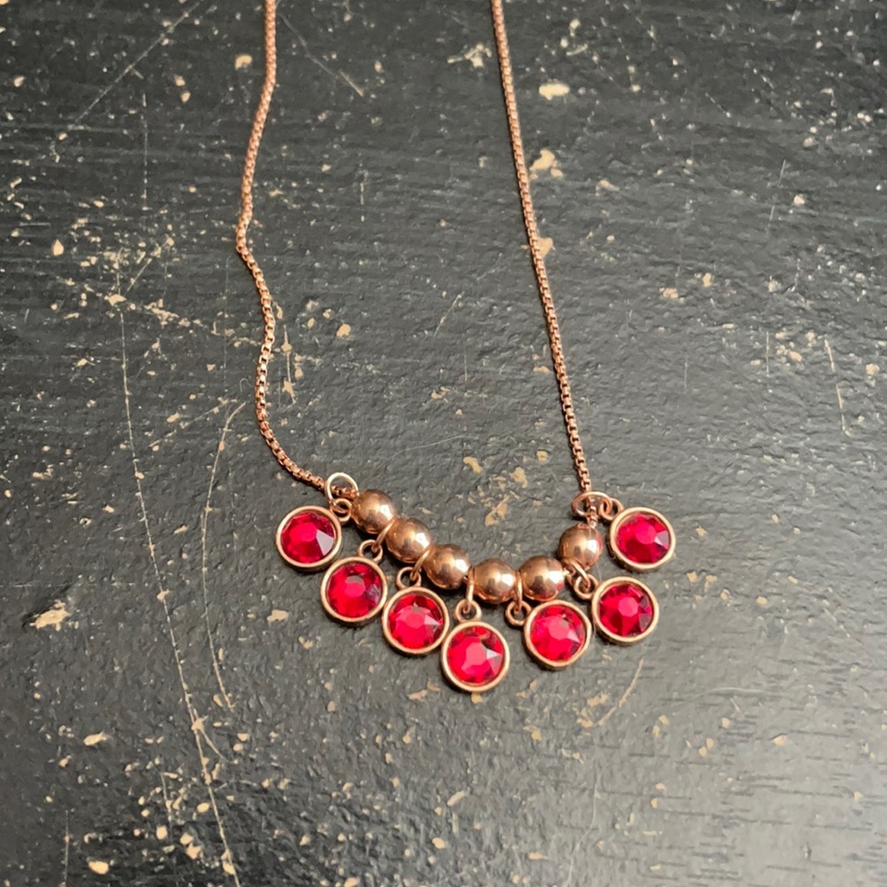 .925 rose gold color necklace with red crystals